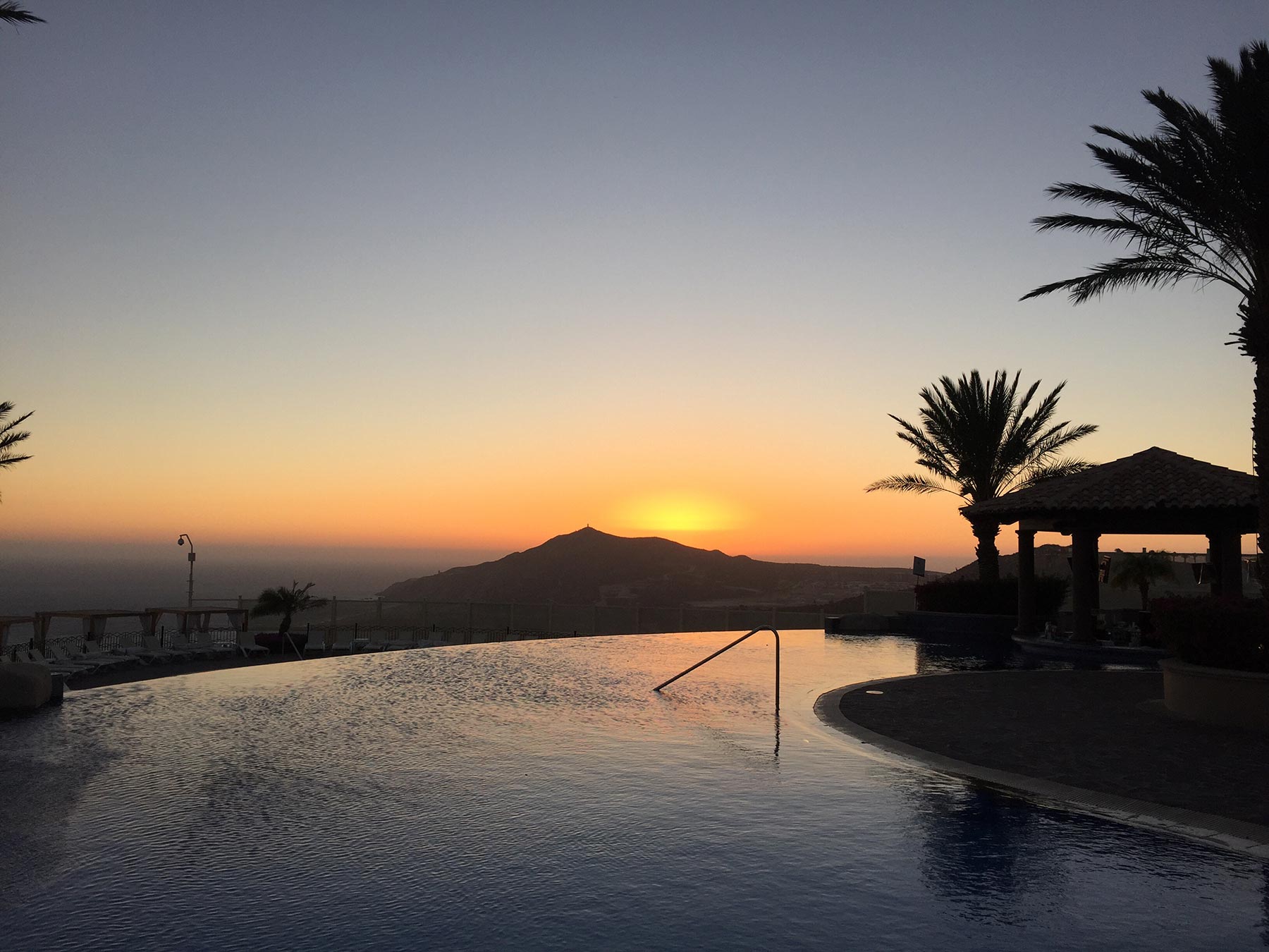 resort-pool-sunset-RAJV5MM.jpg